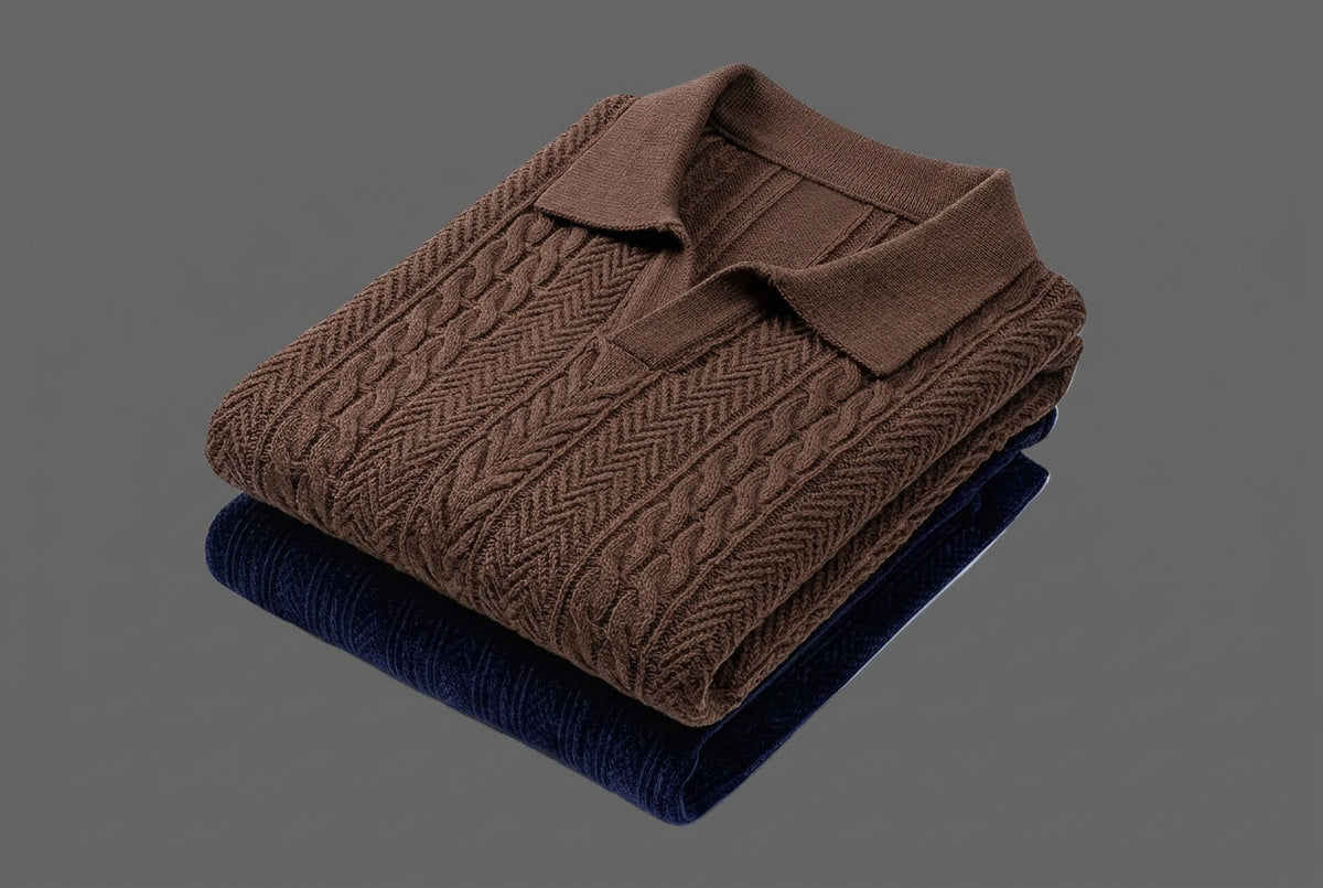 A folded brown ribbed knit collared shirt with a matching pocket, stacked on top of a navy blue folded garment, against a solid dark gray background.