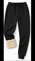 Black jogger-style pants with a beige sherpa lining visible at the hem, shown against a white background.