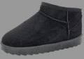 A single black suede ankle boot with a thick black sole, shown from a side profile on a white background.